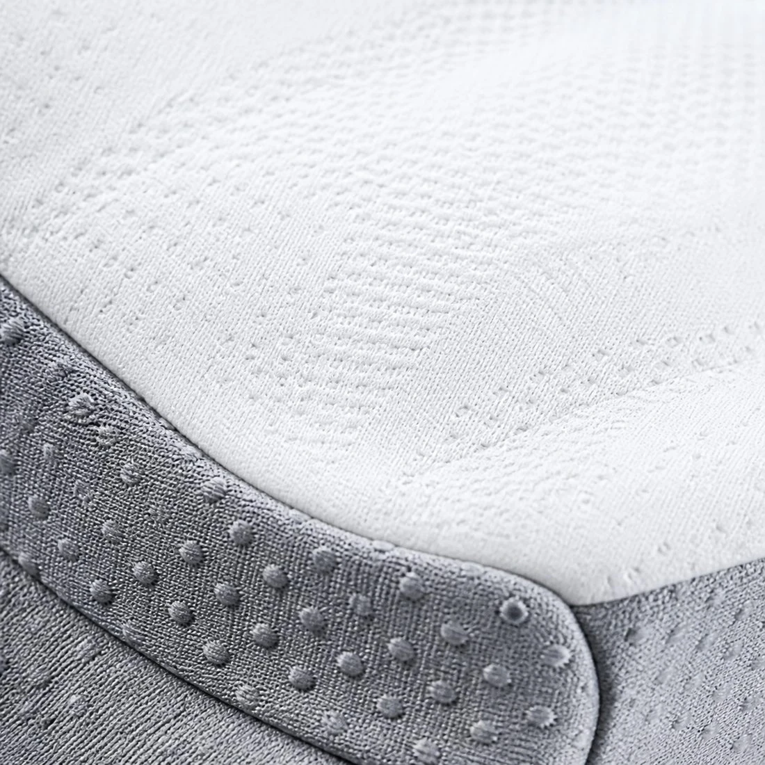 Close-up of the TheraPillow breathable knit fabric texture